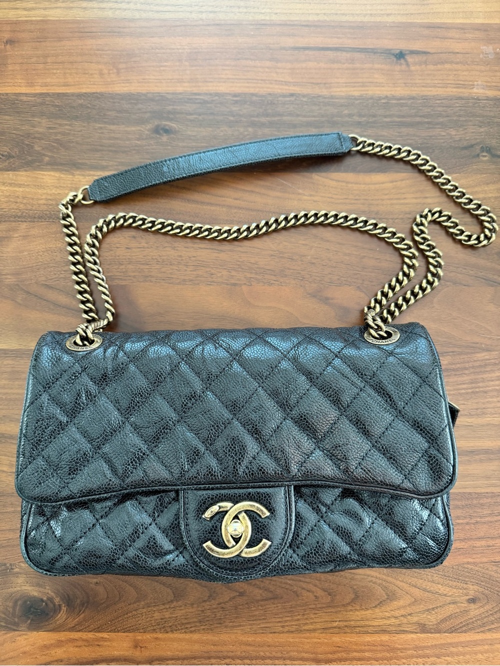 CHANEL Black Quilted Leather Shoulder Bag with Gold Chain Strap